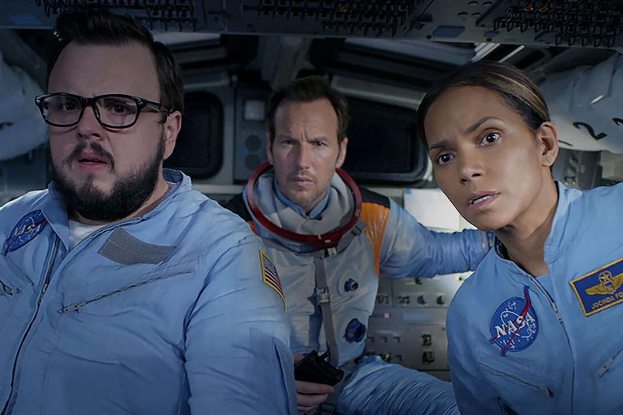 Three astronauts in space